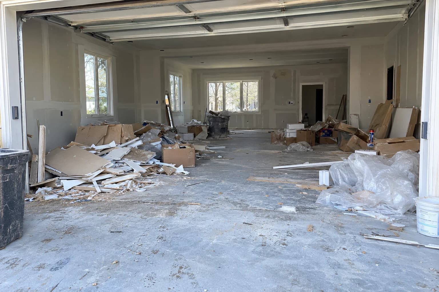 Generated before example: construction debris fills a home addition and garage